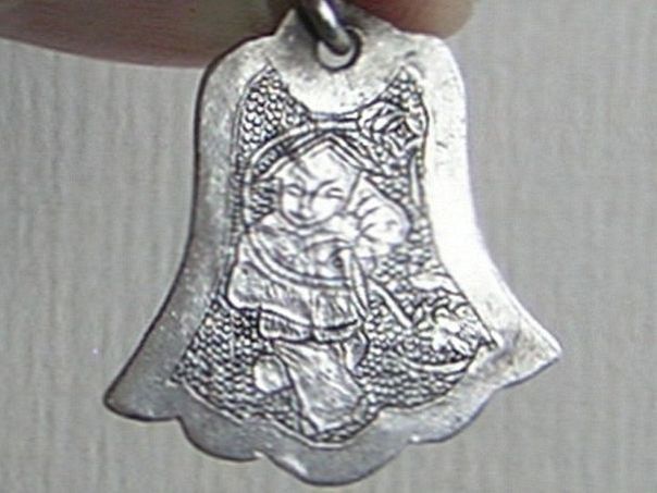 Amulet of a boy with a lotus flower – (8801)